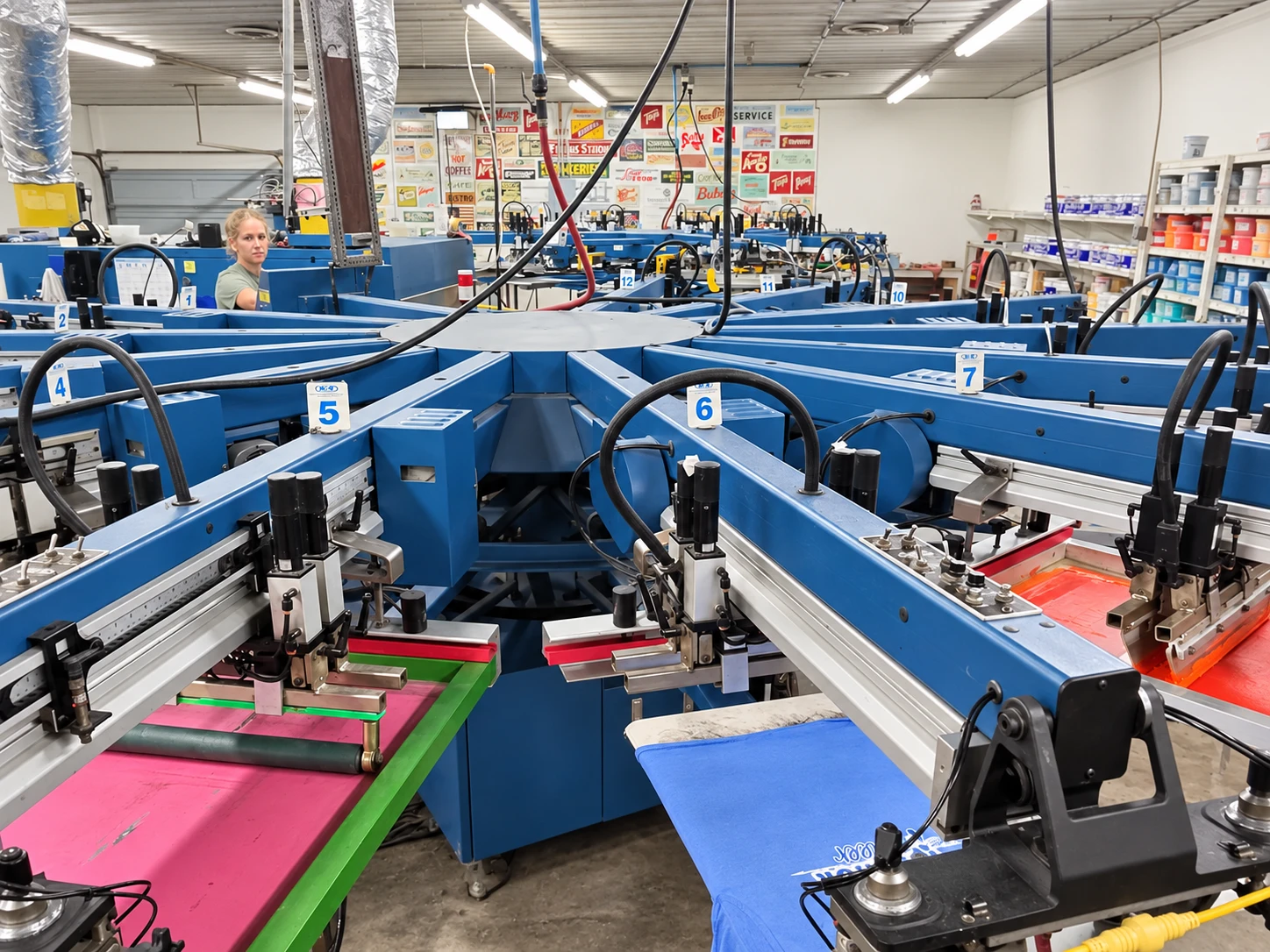 Edited photo of the blue screen printing press at Del Print